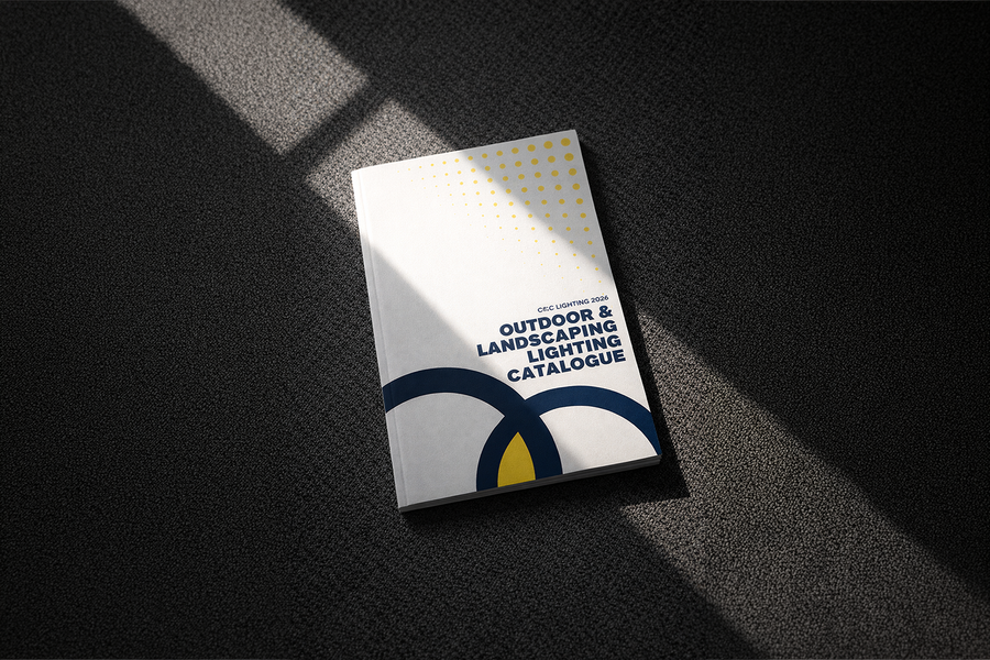 C&C Lighting 2026 Outdoor and Landscaping Lighting Catalogue on dark textured carpet with natural window light